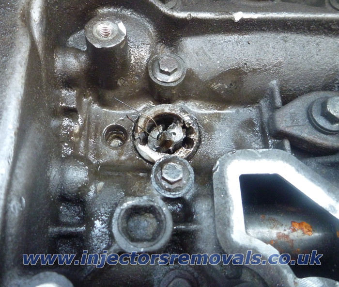 Snapped injector removed from Renault Trafic
                with 2.0 engine